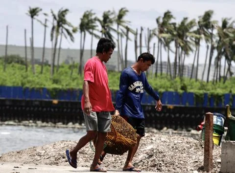 Second typhoon to enter Philippines as it battles with super typhoon Saola, Para 写真素材
