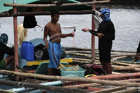 Second typhoon to enter Philippines as it battles with super typhoon Saola, Para 写真素材