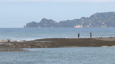 A second view of surfers who do stretching exercises Stock Footage 57682431