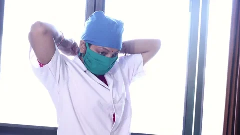 Second Wave Of Covid-19,  Indian Female Doctor Or Nurse  Getting Ready, Stock Footage 130224928