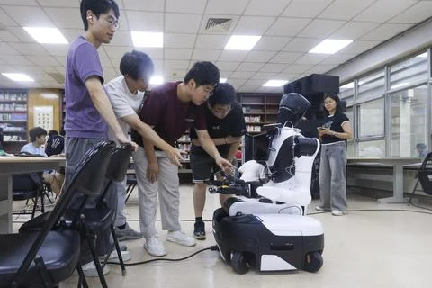 Second World Humanoid Robot Games scenario competition kicks off in Beijing Stock Photos