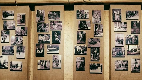 Second World War Memory Wall with Historic Images from Occupied Poland Stock Footage 340194000