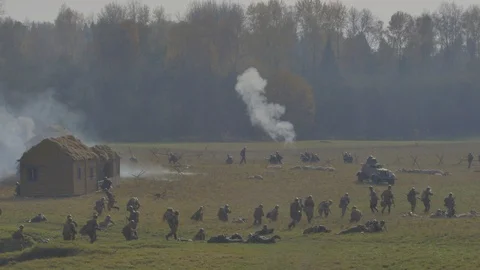 Second World War reenactment on autumn field in slow motion shot Stock Footage 101218315