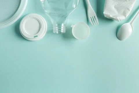 Secondary raw, plastic things for processing or recycling flat lay on the b.. Stock Photos