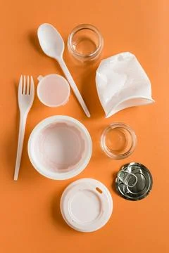 Secondary raw, plastic things for processing or recycling flat lay on the b.. Stock Photos