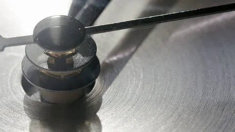 Seconds hand of a clock ticking around in the morning sunlight Stock Footage 74364593