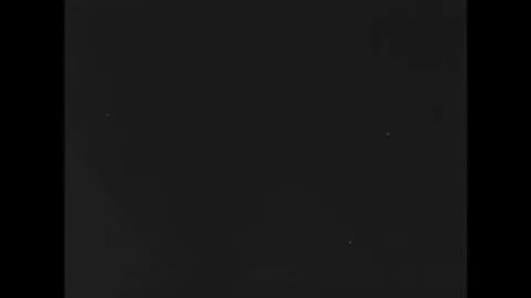 A secret agent transmits a coded message back to headquarters in 1943. Stock Footage 143839453