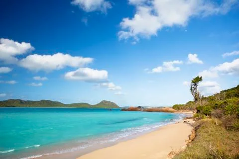A secret and pristine beach difficult to reach in Antigua. Stock Photos