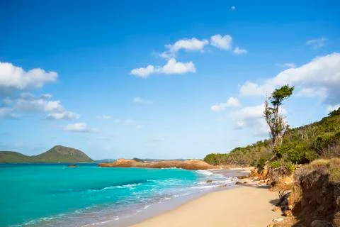 A secret and pristine beach difficult to reach in Antigua. Stock Photos