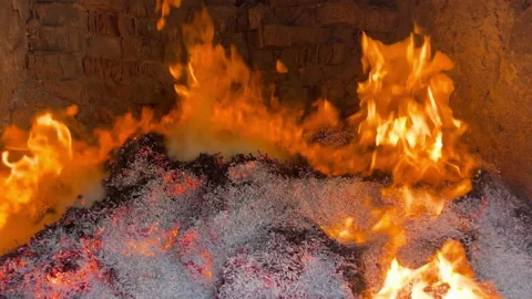 Secret documents are burned in an oven with fire after being processed by paper Stock Footage 221537417