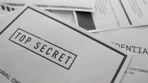 Secret paper document is left on a desk then taken out. Classified information Vídeo Stock 138440032