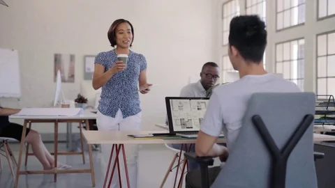 Secretary bringing coffee to manager, taking notes after Video stock 71631332