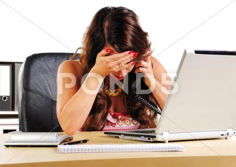 Secretary to call in desperation in the office Stock Photos