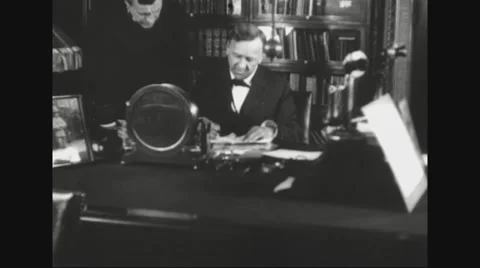 Secretary Josephus Daniels sitting at his desk and working Stock Footage