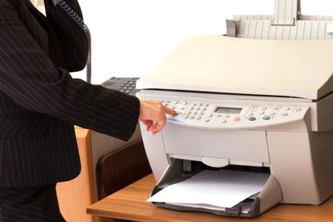 Secretary using printer Stock Photos