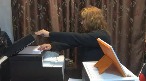Secretary working in the office copier Vídeos de archivo 10487652