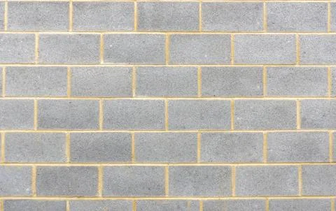 Section of breeze block wall background Stock Photos