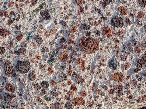 Section of building stone. Structure of concrete. Hard uneven surface. Stock Photos