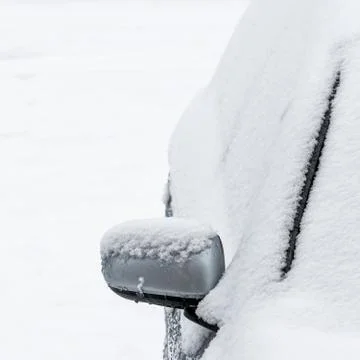 Section of a car covered in snow square composition Stock Photos