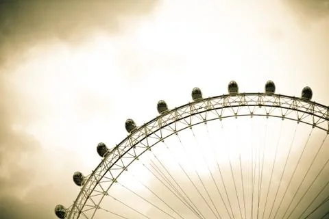 A section of The London Eye with a cloudy background Stock Photos