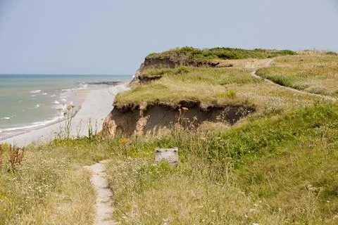 This section of the Norfolk coast at Weybourne is eroding rapidly. Sea level  Foto stock