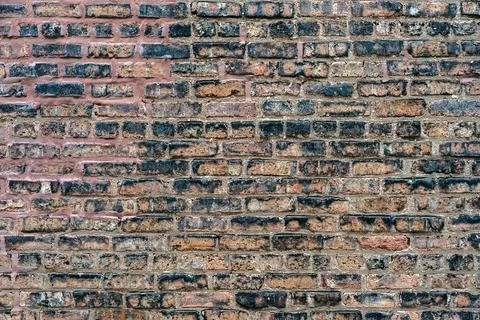 Section of an old brick wall. Stock Photos