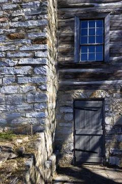 Section of an old building make of stone and timber Stock Photos
