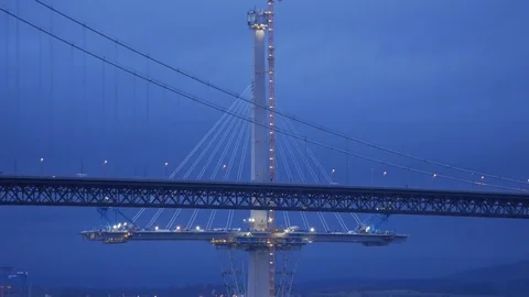Section of The Quuensferry crossing and the Forth Road Bridge at blue hours. Stock Footage 72857788