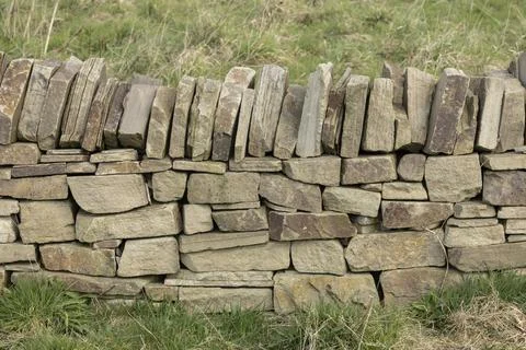 Section of recently laid dry stone wall Stock Photos