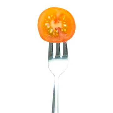 Section red tomato sliced with fork Stock Photos