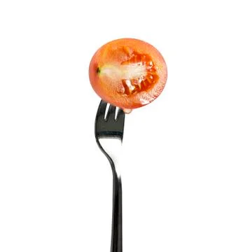 Section red tomato sliced with fork Stock Photos