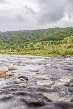 A section of the stream and rocks of the El Valle river, long exposure photog Stock Photos
