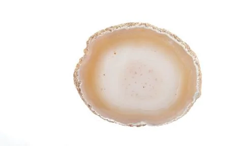 Section of a white and orange geode Stock Photos