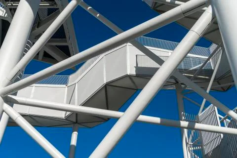 Section of a white observation tower with blue sky in the background Stock Photos