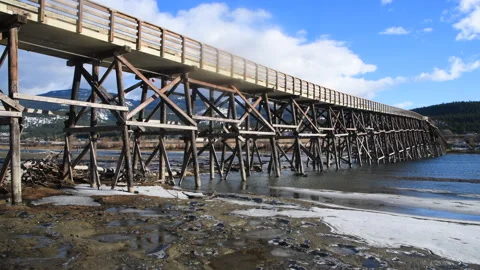 Section of a wooden bridge spanning the Thompson River at Pritchard in B.C. 4k Stock Footage 222662342