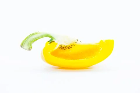 Section yellow capsicum with seed Stock Photos