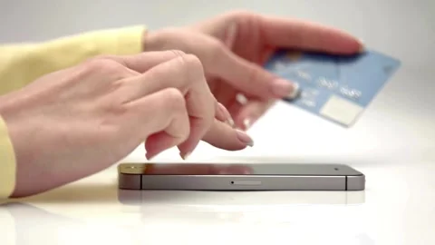 Section of young woman using a laptop while making online payment through c.. Stock Footage 265932409