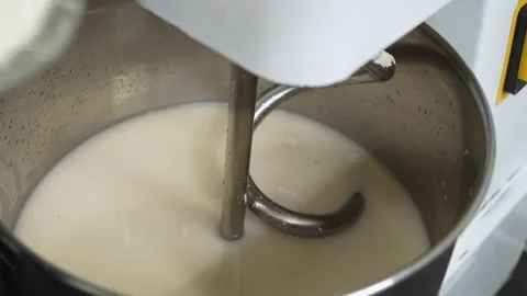 Secuence of the process of kneading dough in a spiral kneader Stock Footage 251301491