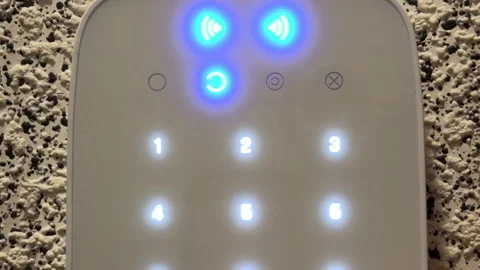 Secure Alarm Keypad Glows While Emitting A Sharp Electronic Beep Stock Footage 328694432