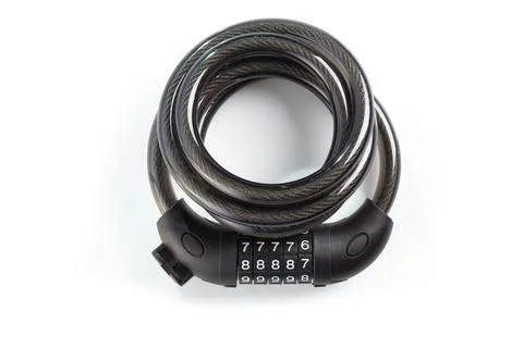 A secure bike lock featuring a sturdy cable and combination mechanism Stock Photos