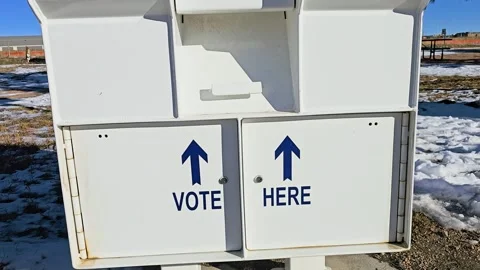 Secure election ballot box with Vote Here arrows, mail-in voting slots Stock Footage 340866717