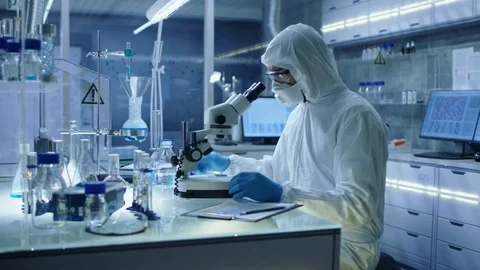 In a Secure High Level Research Laboratory Scientist in a Coverall  Stock Footage 75467407