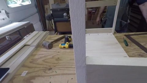 Secure legs to shelf top. Stock Footage 81714642