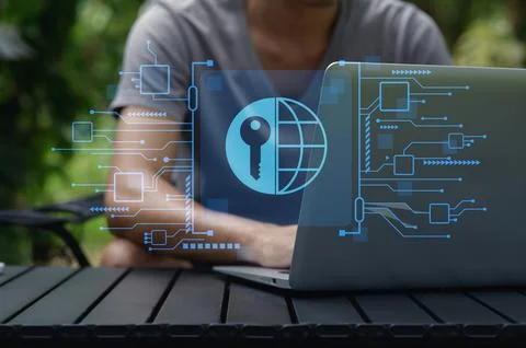 Secure Network Access Concept with Digital Key and Laptop Display Stock Photos