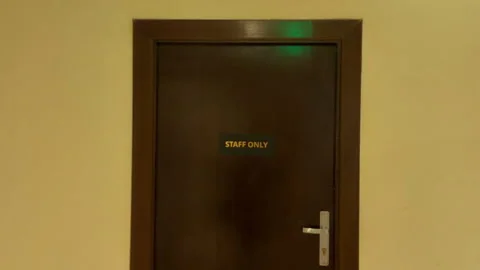 Secure Passage Reserved Exclusively For Employees In Beige Corridor With 库存影片 337938569