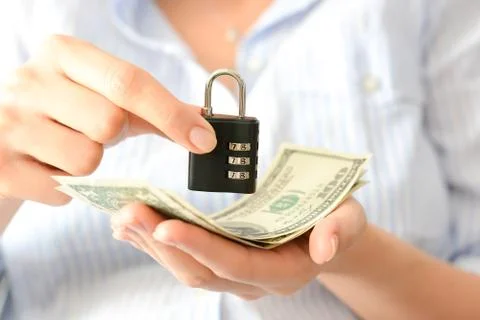 Secure your savings concept with cipher lock and money Stock-Fotos