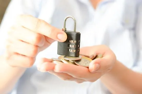 Secure your savings concept with cipher lock and money Stock-Fotos