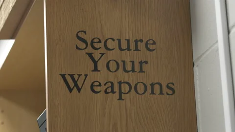 Secure Your Weapons Sign 4K Stock Footage 145956992