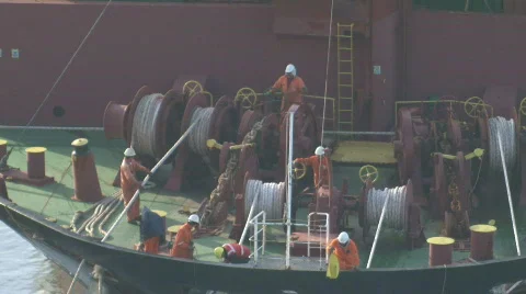 Securing ship ropes Stock Footage 480084