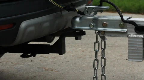 Securing trailer hitch chains. Stock Footage 38261892